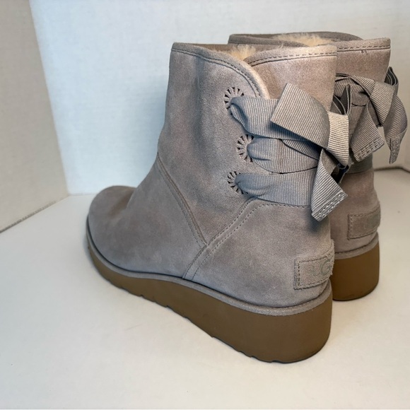 UGG CLASSIC MINI DREW SUNSHINE PERF SEAL BOW ANKLE BOOT - Picture 8 of 16